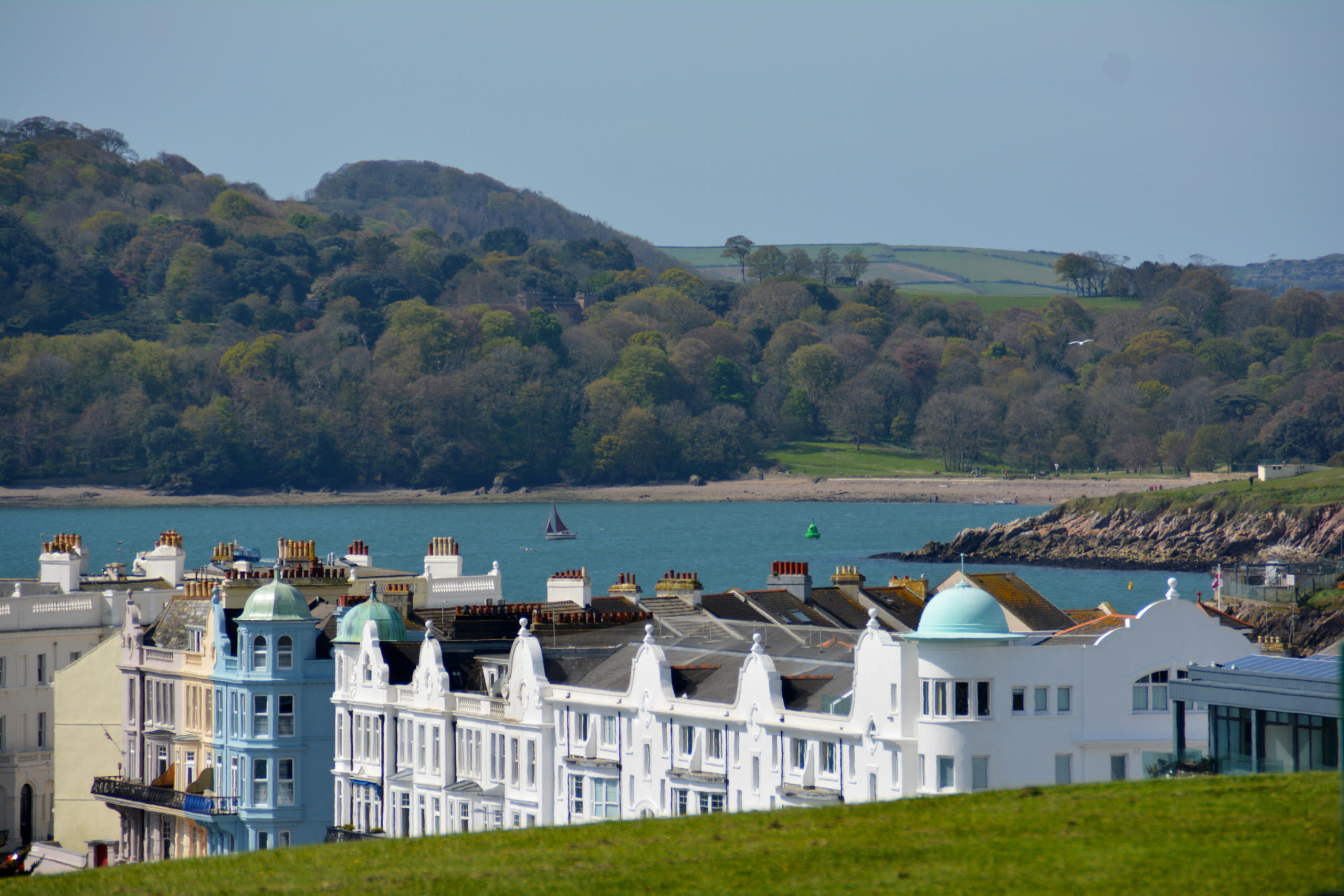 Building rooftops overlooking Plymouth beach.